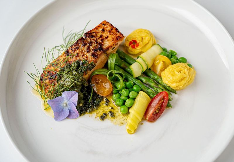 Colorful gourmet catering dishes with tropical-inspired flavors