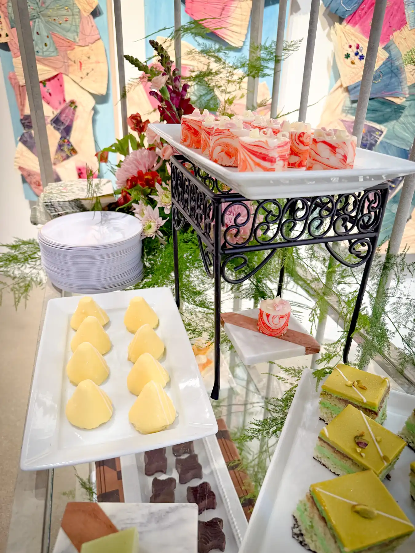 Gourmet dessert display for corporate event catering in the Inland Empire, featuring custom cakes and pastries.